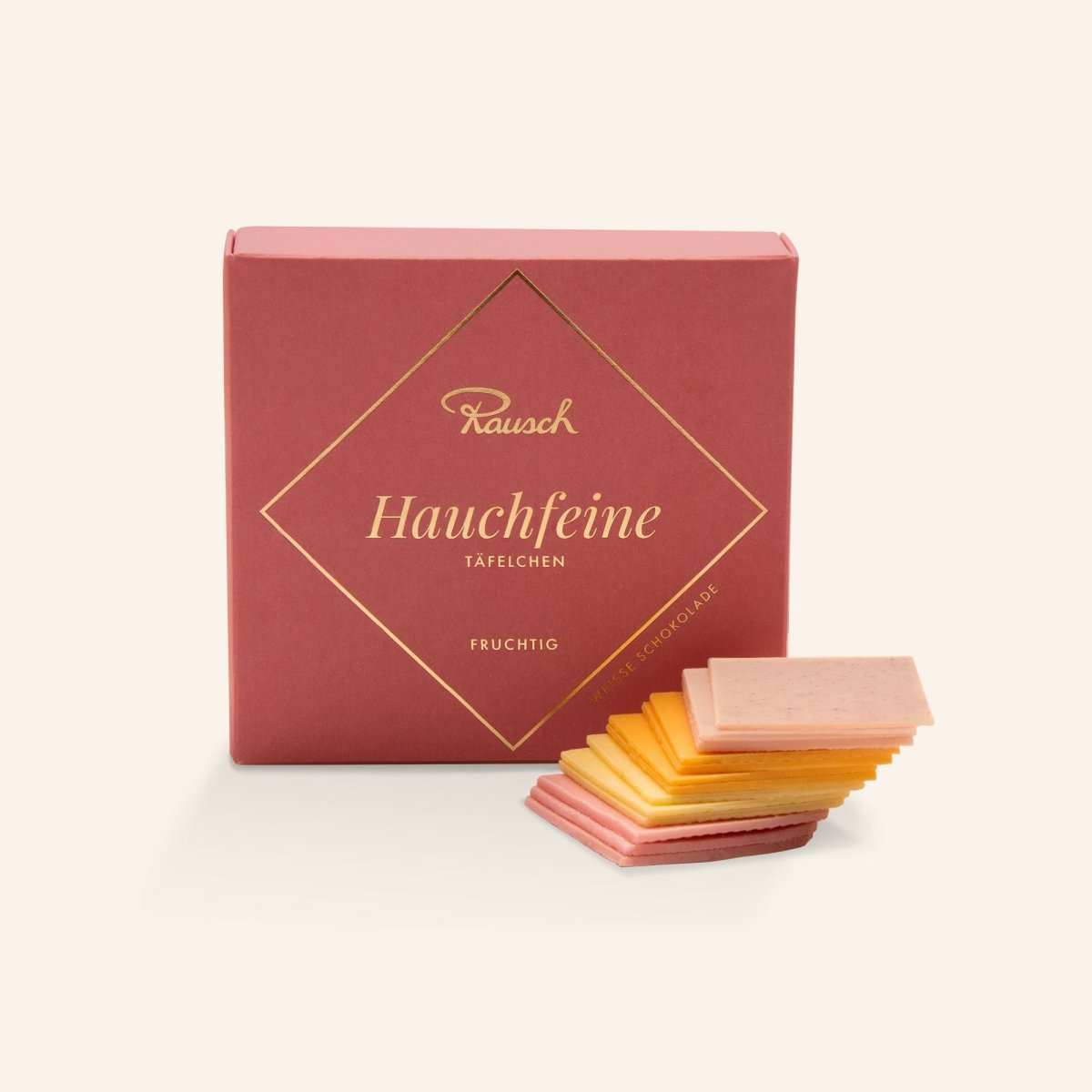 Rosa Schachtel Hauchfeine Täfelchen fruchtig.