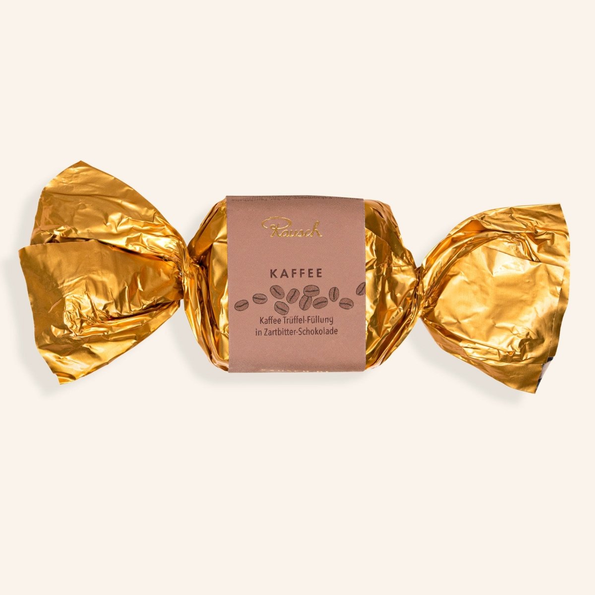 Goldene Happenverpackung mit Kaffeegeschmack, Rausch-Logo sichtbar.