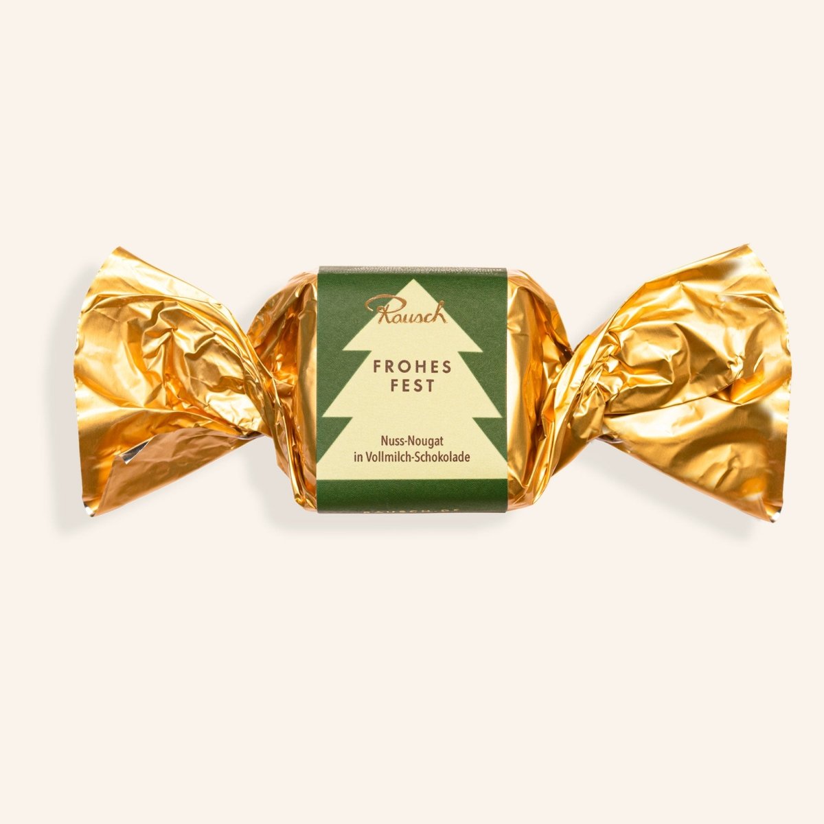 Goldverpackter Schokoladenhappen mit Tannenbaumetikett, Aufschrift 'Frohes Fest', Nuss-Nougat in Vollmilch-Schokolade.