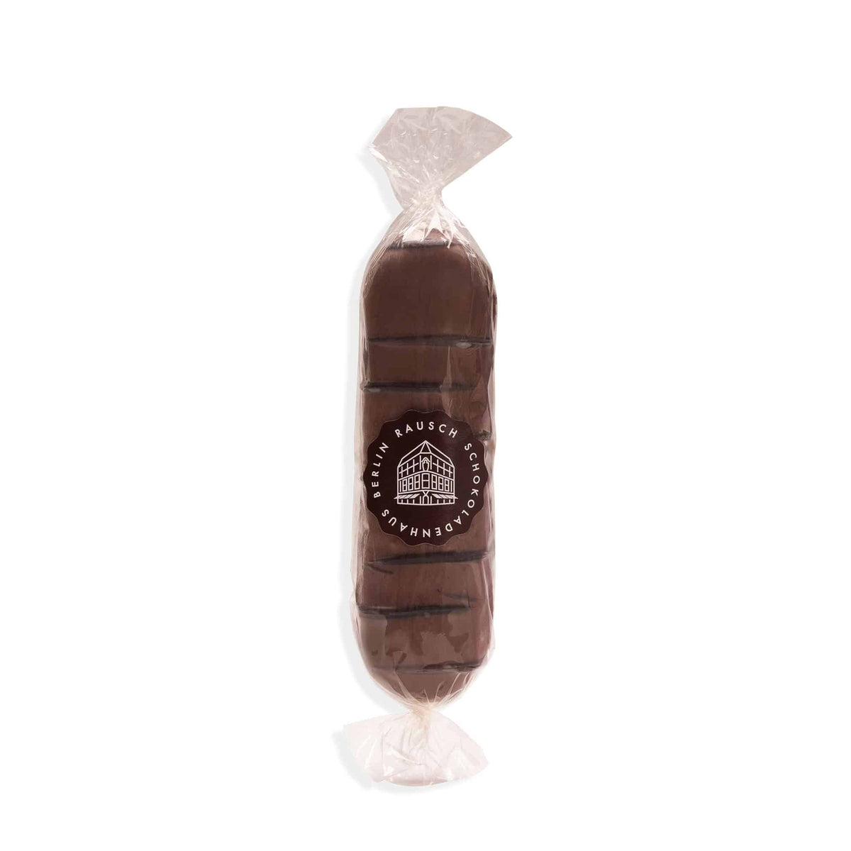 Nougatbrot mit dunkler Schokolade, umhüllt von transparenter Folie, mit Rausch-Logo bedruckt.