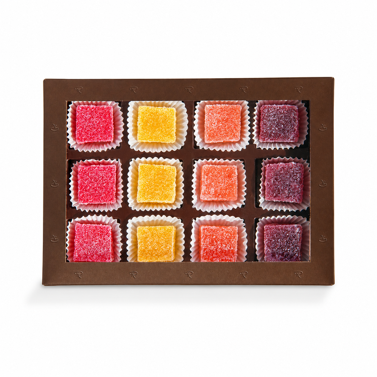 Quadratische Fruchtgelees in verschiedenen Farben in einer edlen Schachtel.