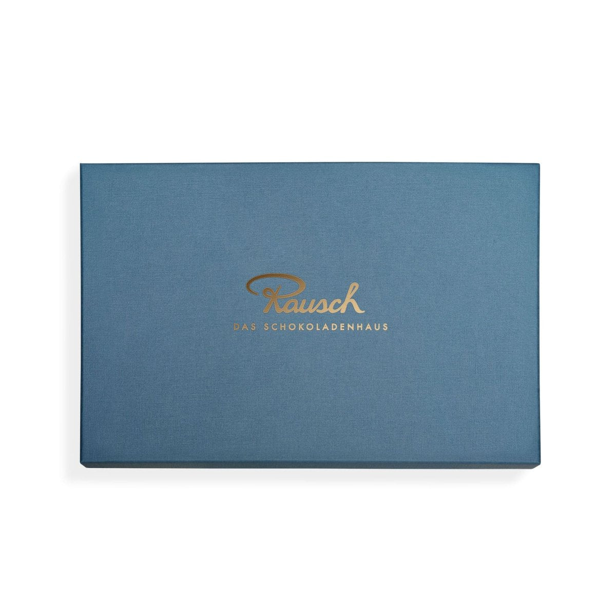 Geschlossene, blaue Rausch Schokoladen-Geschenkbox mit goldener Aufschrift "Rausch Das Schokoladenhaus".