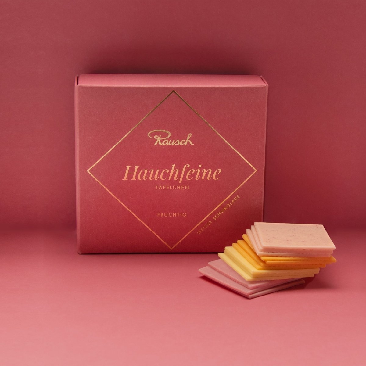 Rosa Schachtel Hauchfeine Täfelchen  mit 4 fruchtigen Täfelchen von Rausch