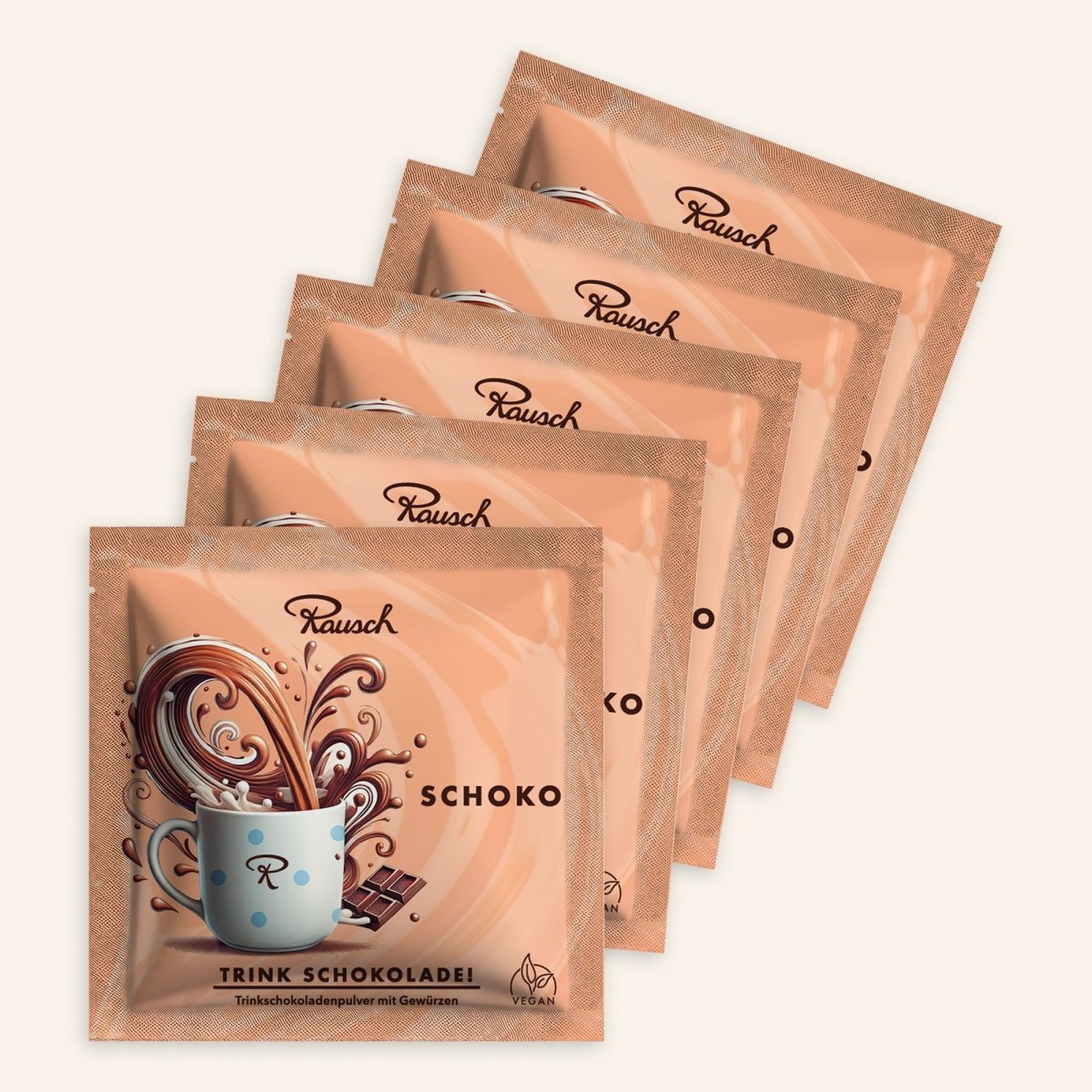 Fünf Rausch Trinkschokolade-Packungen mit wirbelnder Schokolade und Tasse auf der Verpackung abgebildet.