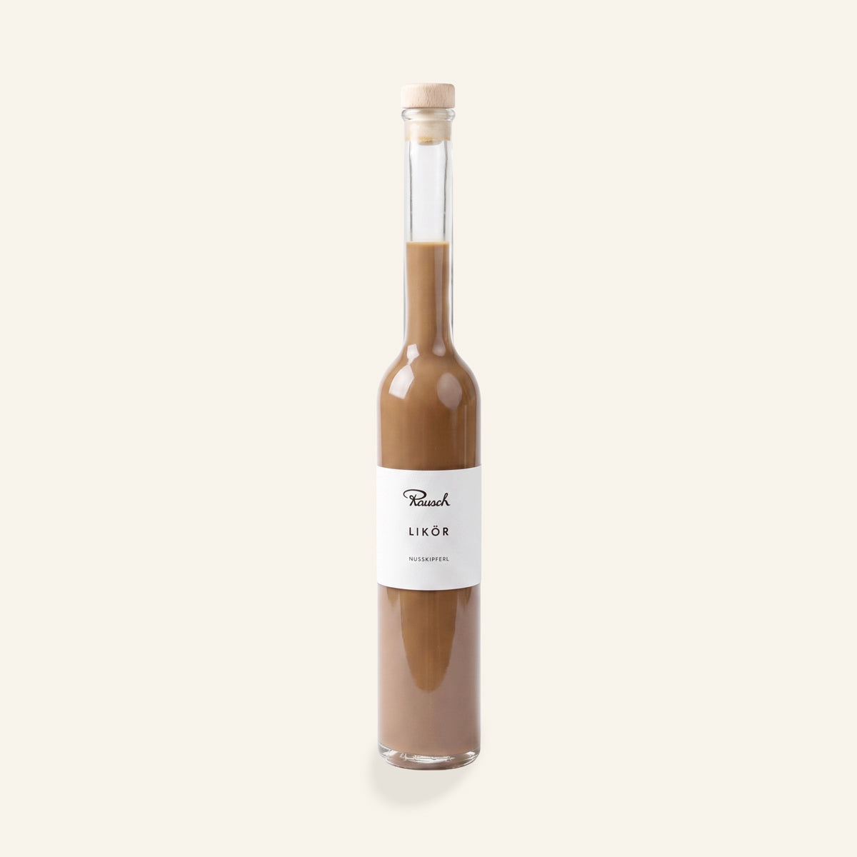 Schlanke Flasche mit braunem Nussskipferl Likör und schlichtem weißen Etikett. - Rausch
