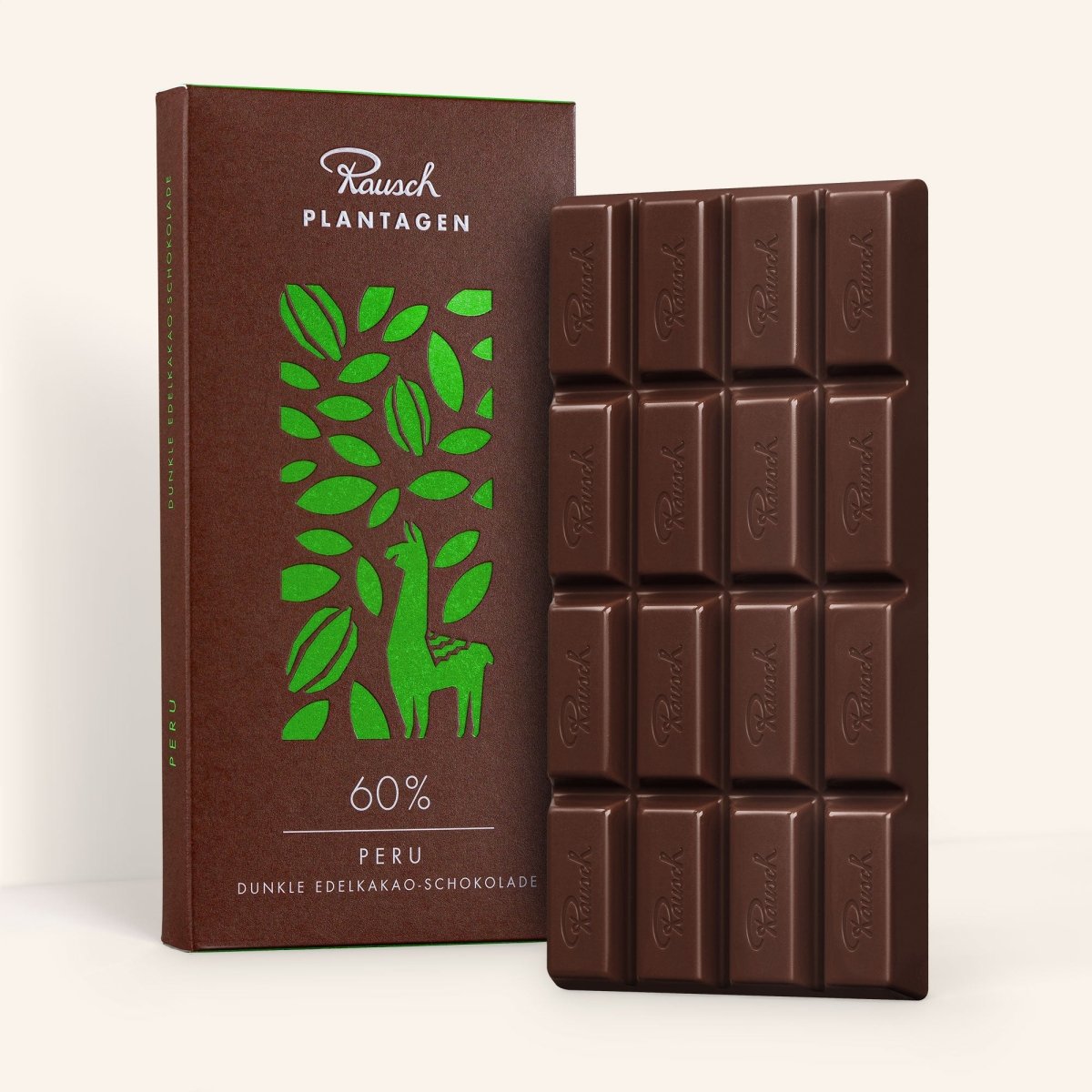 Rausch Peru 60% Dunkle Edelkakao-Schokolade Tafel mit Verpackung, grüner Aufdruck und Schokoladentafel.