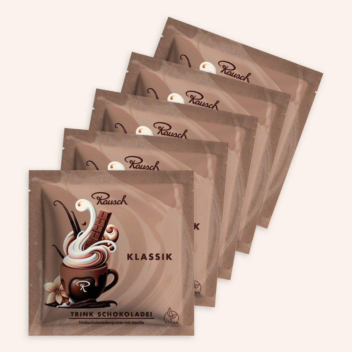 Packung Rausch Klassik Trinkschokolade, 5 Portionsbeutel mit Schokoladentasse und Vanilleschote.