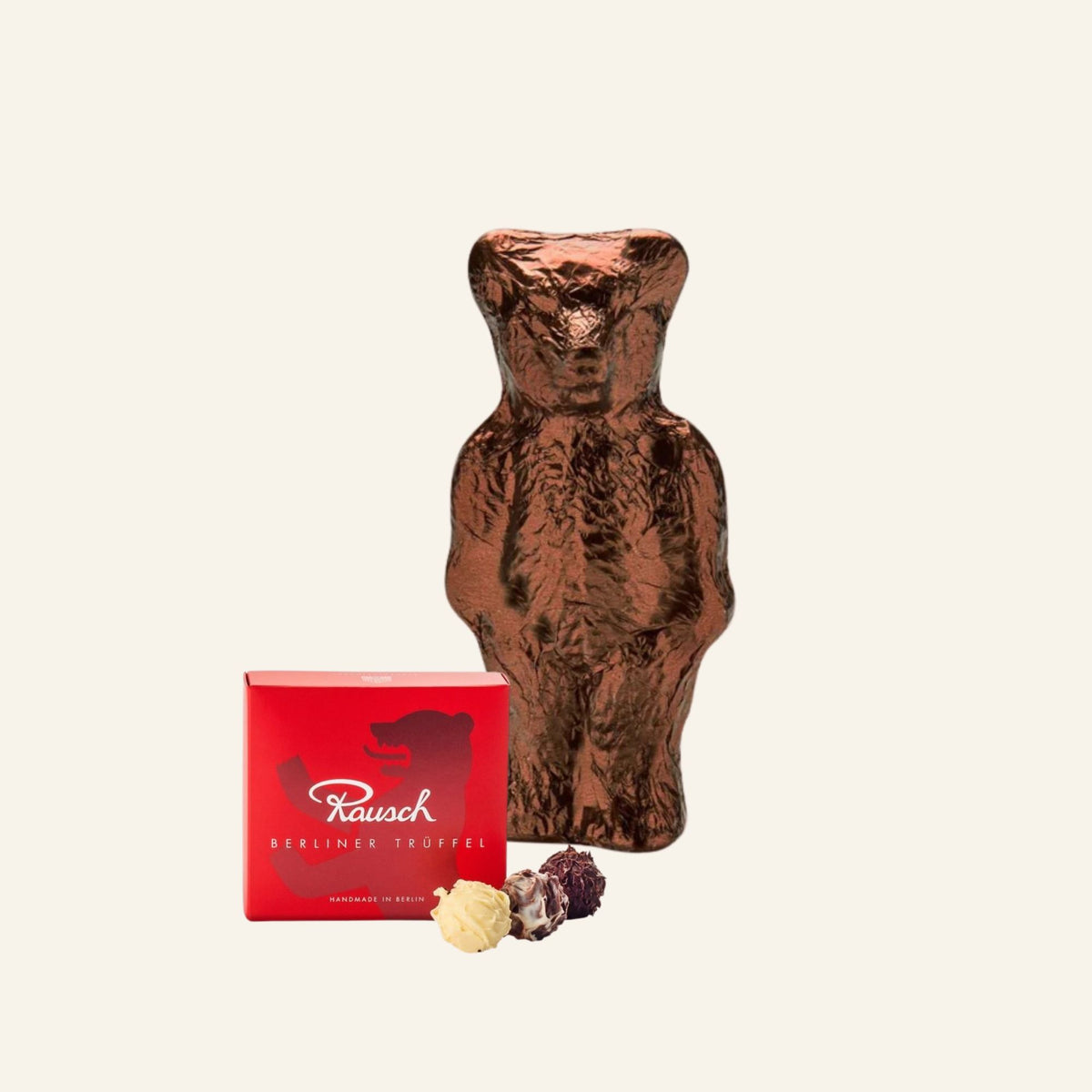 Handgefertigte Schokoladen-Trüffel mit Berliner Bär in brauner Schokolade, rote Geschenkbox. - Rausch