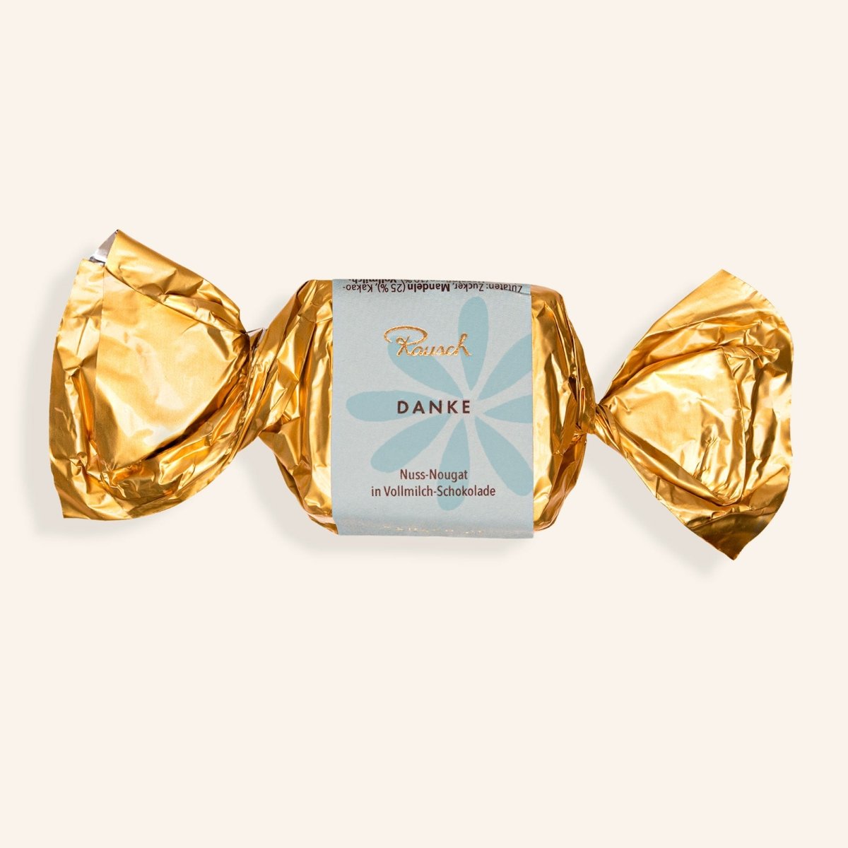 Goldverpacktes Nougat-Schokoladenkonfekt mit "Danke" Botschaft von Rausch.