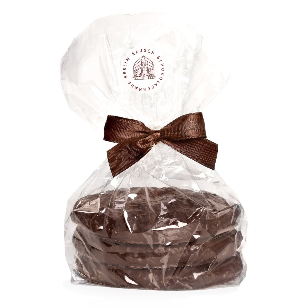 Verpackte Schokoladenlebkuchen mit brauner Schleife und Rausch-Logo auf transparenter Folie.