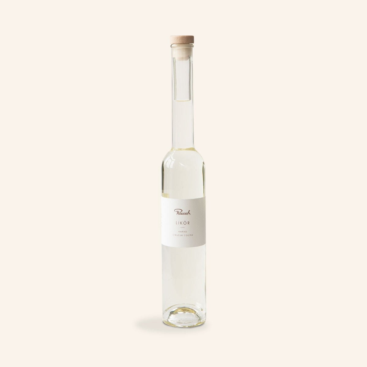 Flasche Rausch Kakaolikör mit hellem Etikett auf hellem Hintergrund.