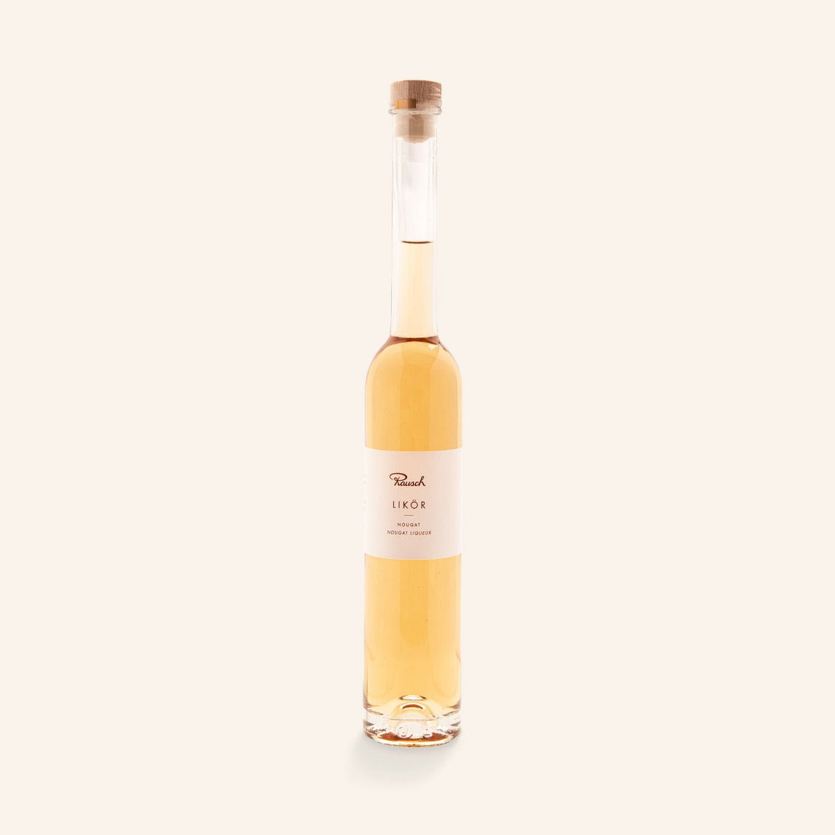 Schlanke Flasche Rausch Likör Nougat auf hellem Hintergrund.