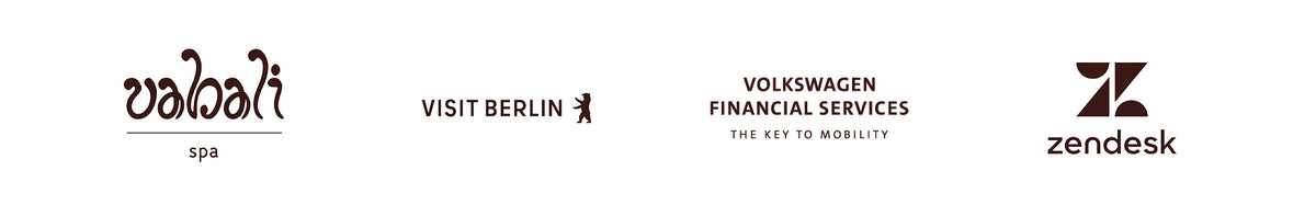 Logos von Vabali Spa, Visit Berlin, Volkswagen Financial Services und Zendesk auf weißem Hintergrund.